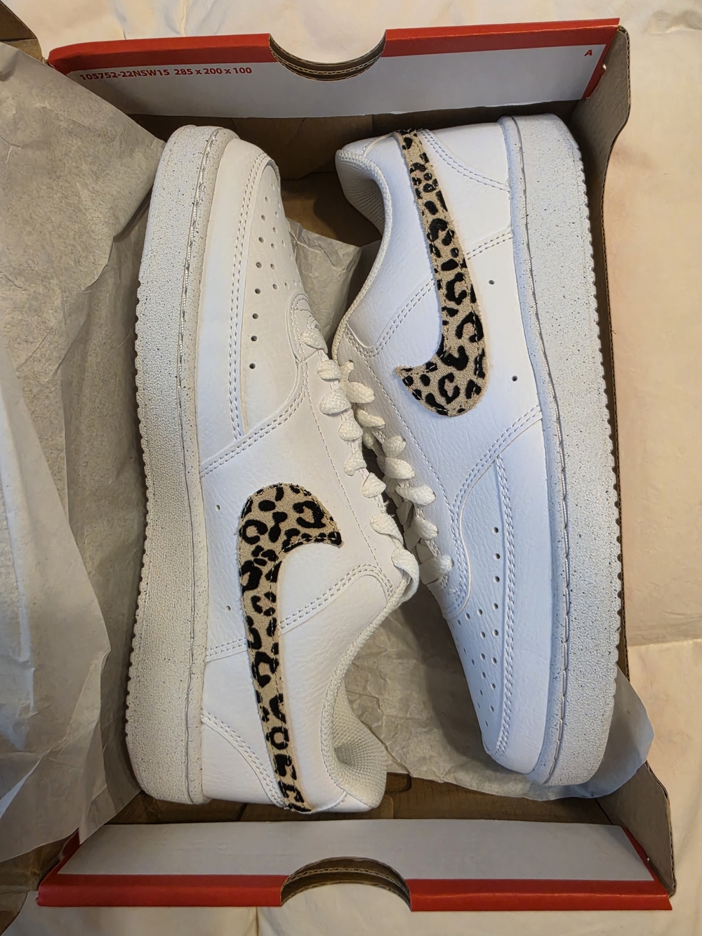 Nike Women's White Sneakers with Leopard Swoosh